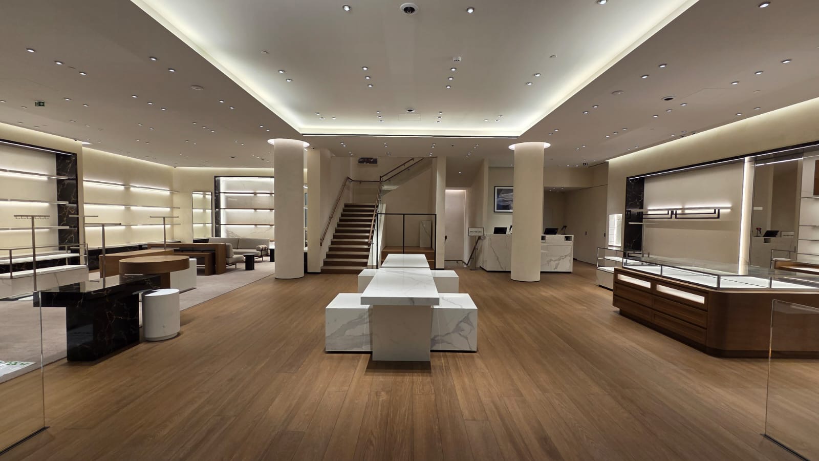 Wide view of seamless microcement commercial showroom by Atelier di Venice London