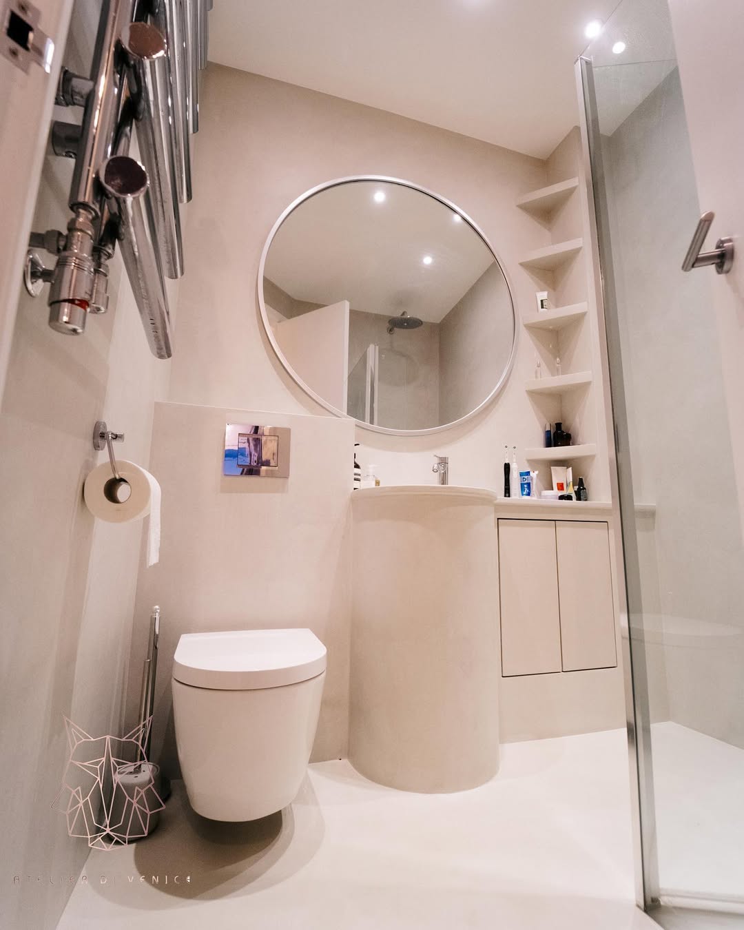 Seamless microcement bathroom with walk-in shower by Atelier di Venice London